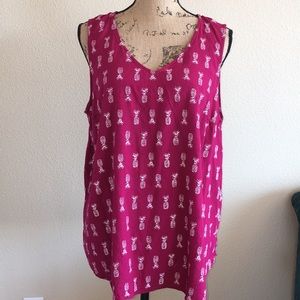 Dark pink slight v-neck tank top.